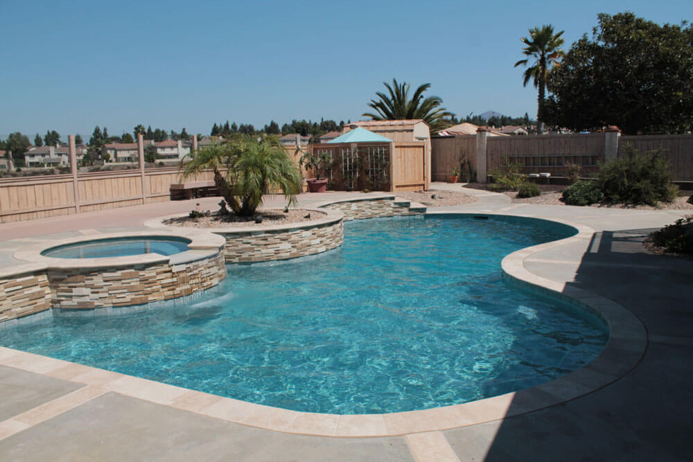 Freeform-Pool-with-Raised-Spa-After-Renovation