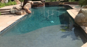 Custom-Pool-with-Tanning-Ledge-and-Raised-Spa